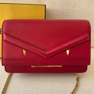 Authentic Fendi clutch in amazing condition worn twice with box included.